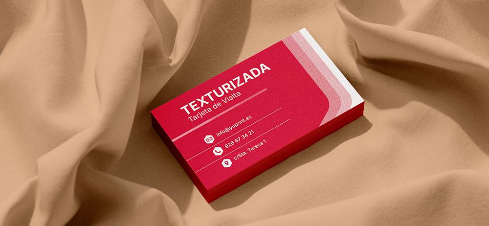 Stack de tarjetas texturizadas Yuprint en tonos rojos, ideal para marcas que buscan elegancia.