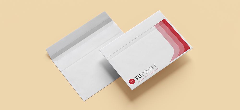 Sobres sin ventana Yuprint con diseño moderno en rojo y blanco, perfectos para envíos y documentos.
