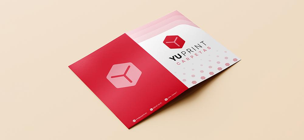 Carpeta corporativa Yuprint con diseño moderno en tonos rojos y logotipo destacado, ideal para presentación profesional.