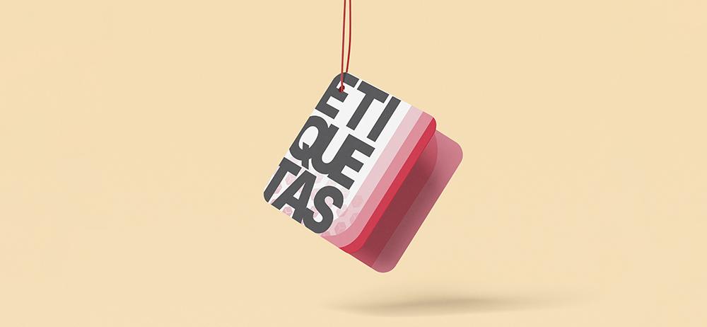 Etiqueta plegada Yuprint en tonos rojos con diseño moderno, ideal para ropa, accesorios y productos premium.