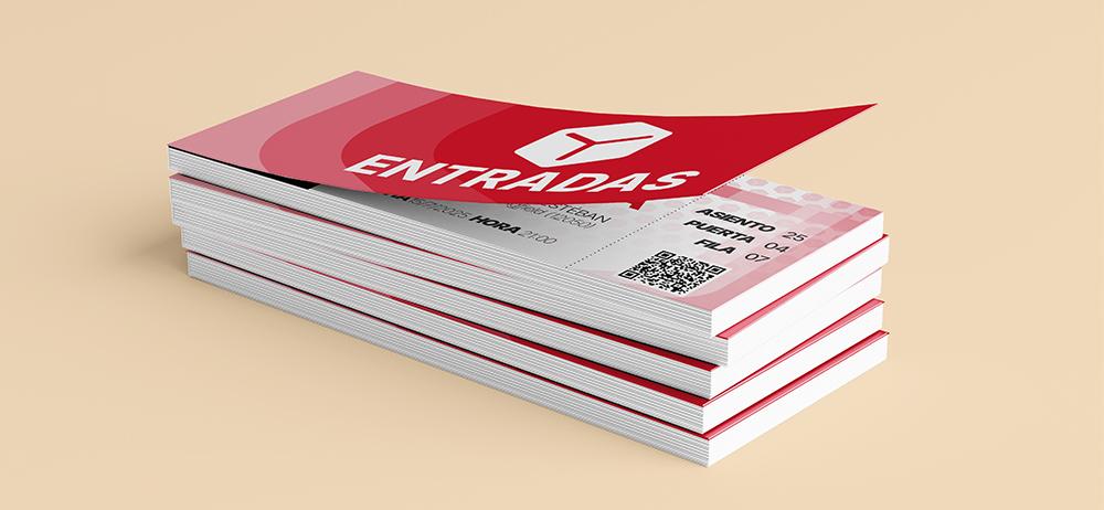 Bloque de entradas impresas YUPrint apiladas con diseño profesional para eventos.